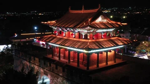 Aerial view of night lakeside classical pavilion lights water scenery in Dali Video stock 337923786