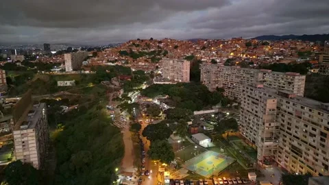 Aerial view of night slums of Caracas, Venezuela. The most dangerous cities in Stock Footage 221835325