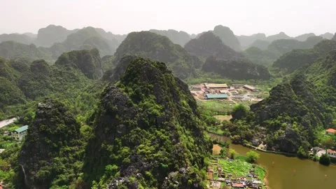 Aerial view of ninh binh landscape, vietnam, a popular tourist destination .. Video stock 335087505