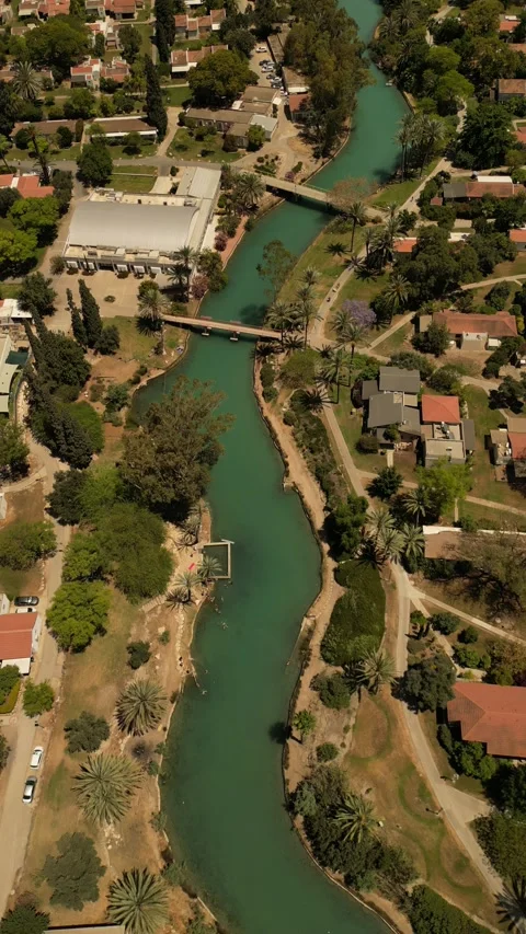 Aerial View of Nir David Kibbutz and Turquoise Water Canals Israel Vídeos de archivo 337630079
