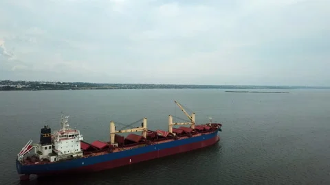 Aerial view nternational cargo ship at industrial import-export port sailing  Stock Footage 196384675