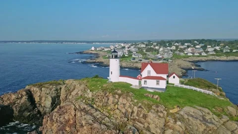 Aerial view of Nubble Lighthouse situated on a rocky island off the coast o.. Stock Footage 337384812