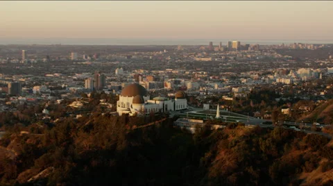 Aerial view of Observatory at Griffith Park Los Angeles at sunrise 動画素材 64796246