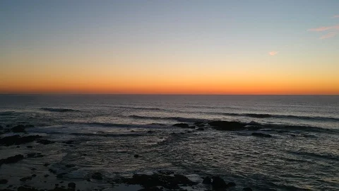 Aerial view, ocean after sunset with beautiful blue orange gradient sky 動画素材 95114912