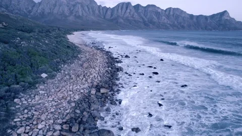 Aerial view of ocean and beach with mountains 動画素材 201838630