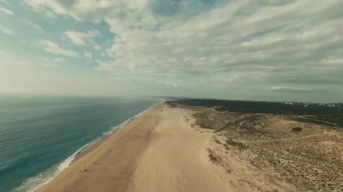 Aerial view of ocean and long sandy beach Stock Footage 340226728