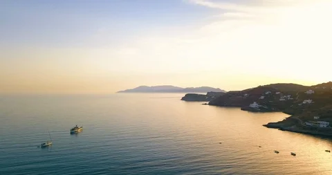 Aerial View of the Ocean and Paros Island in Greece During Gorgeous Sunset Stock Footage 101487331