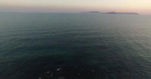 Aerial view of ocean at sunset Stock Footage 61538815