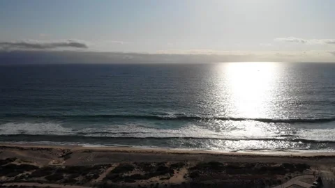 Aerial View of an Ocean with Sunset Stock Footage 142943390