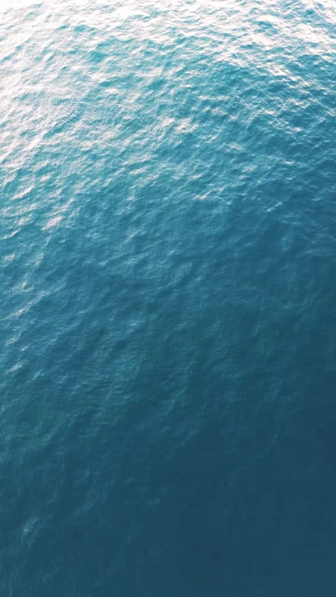 Aerial View of Ocean Surface with Ripples Stock Footage 311351377