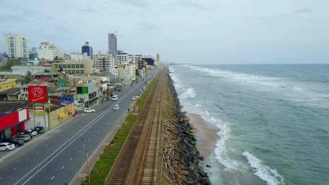 Aerial view of ocean wave reaching the coastline in Colombo, Sri Lanka Stock-Footage 124385430