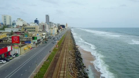 Aerial view of ocean wave reaching the coastline in Colombo, Sri Lanka Stock-Footage 124385436
