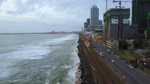 Aerial view of ocean wave reaching the coastline in Colombo, Sri Lanka Stock-Footage 124393200