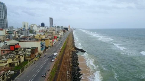 Aerial view of ocean wave reaching the coastline in Colombo, Sri Lanka Stock-Footage 124393564