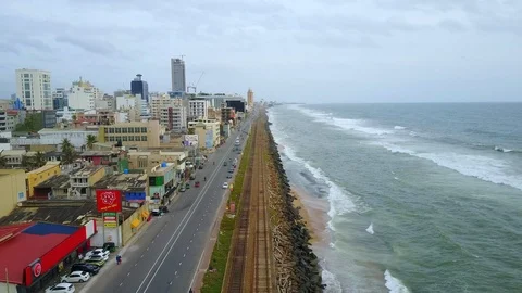 Aerial view of ocean wave reaching the coastline in Colombo, Sri Lanka Stock-Footage 124393644