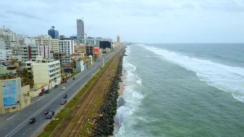 Aerial view of ocean wave reaching the coastline in Colombo, Sri Lanka Stock-Footage 124394807