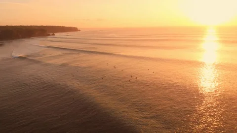 Aerial view of ocean with waves and warm sunset. Stock Footage 116816777