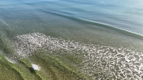Aerial View of Ocean Waves and Sea Foam in Clear Water Video stock 341733326