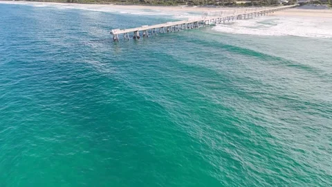 Aerial View of Ocean Waves and Pier at Surfers Paradise Stock-Footage 341908443