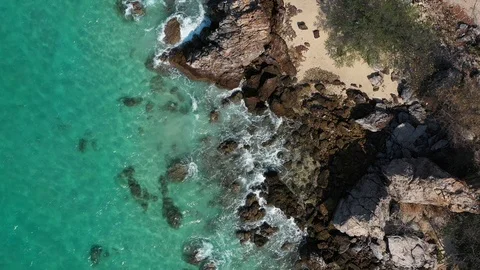 Aerial view. of ocean waves, beach and rocky coastline and beautiful forest. Bea Stock Footage 102172401