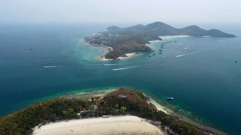 Aerial view of ocean waves, beach and rocky coastline and beautiful forest  Stock Footage 108667543