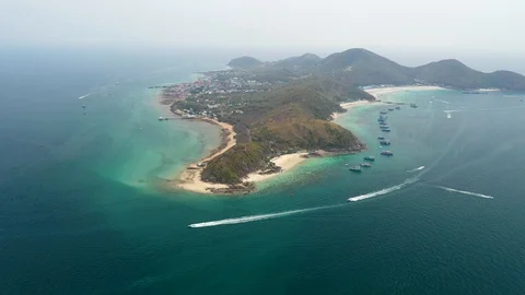 Aerial view of ocean waves, beach and rocky coastline and beautiful forest Stock Footage 108958411