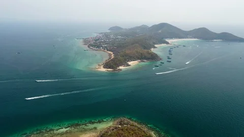 Aerial view of ocean waves, beach and rocky coastline and beautiful forest  Stock Footage 109451654