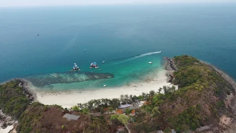 Aerial view of ocean waves, beach and rocky coastline and beautiful Video stock 111328943