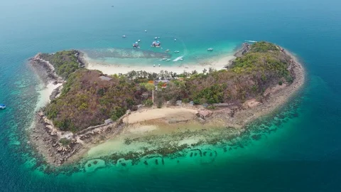 Aerial view of ocean waves, beach and rocky coastline and beautiful forest o 動画素材 112398941