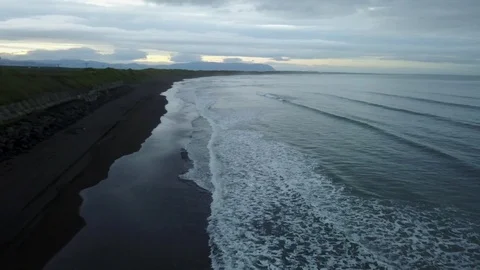 Aerial View Of Ocean Waves On Beach in Eyrarbakki Iceland Stock Footage 118527910