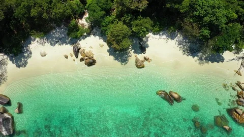 Aerial view of ocean waves, beach and rocky coastline and beautiful forest 스톡 동영상 125321896