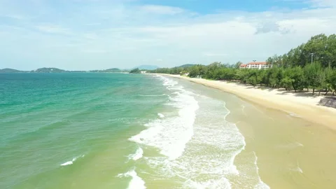 Aerial view. of ocean waves, beach and rocky coastline and beautiful forest. Video stock 150379865