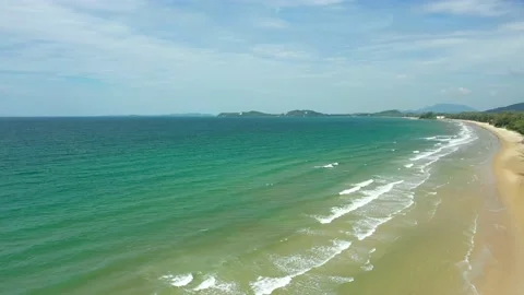 Aerial view. of ocean waves, beach and rocky coastline and beautiful forest Stock Footage 150379900