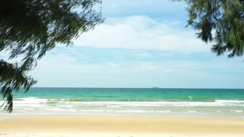 Aerial view. of ocean waves, beach and rocky coastline and beautiful forest. Video stock 150380134