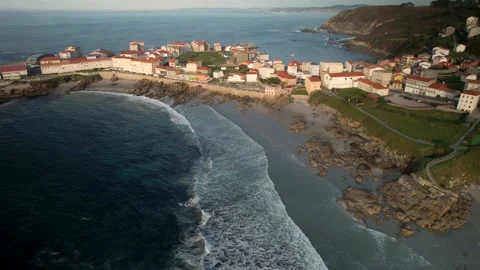 Aerial View Of Ocean Waves On The Beach And Residential Houses Stock Footage 231692108