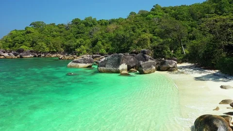 Aerial view of ocean waves, Beautiful tropical beach and rocky  Видео 123848036