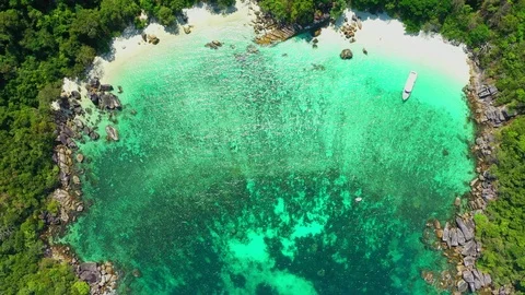 Aerial view of ocean waves, Beautiful tropical beach and rocky  Видео 123849589