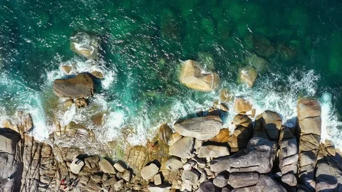 Aerial view of ocean waves, Beautiful tropical beach and rocky 스톡 동영상 123989064