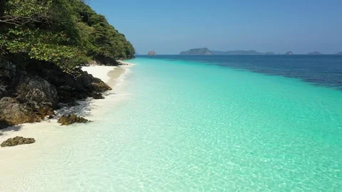 Aerial view of ocean waves, Beautiful tropical beach and rocky Video stock 124597165