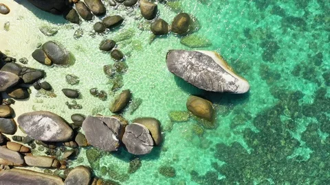 Aerial view of ocean waves, Beautiful tropical beach and rocky Stock Footage 124597287