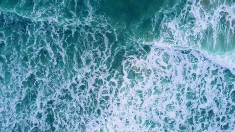 Aerial view to ocean waves. Blue water background Stock Footage 233771962