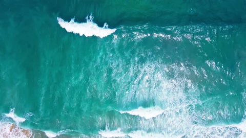 Aerial view to ocean waves. Blue water background Stock Footage 233772078