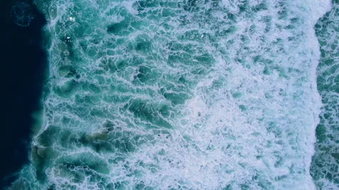 Aerial view to ocean waves. Blue water background Stock Footage 233772159