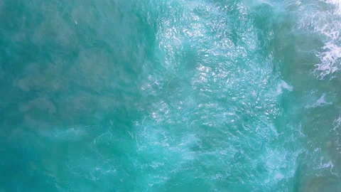 Aerial view to ocean waves. Blue water background Stock Footage 233772236