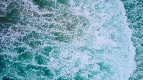 Aerial view to ocean waves. Blue water background Stock Footage 233772277