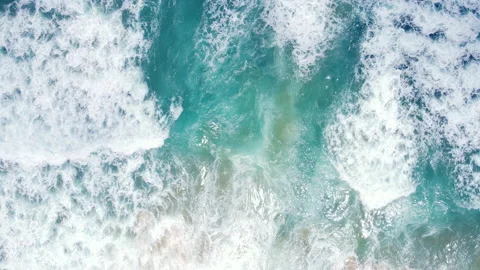 Aerial view to ocean waves. Blue water background Stock Footage 233790878