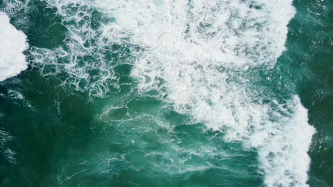 Aerial view to ocean waves. Blue water background Stock Footage 233791491