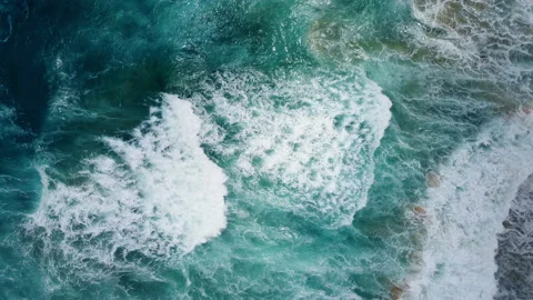 Aerial view to ocean waves. Blue water background Stock Footage 233791633