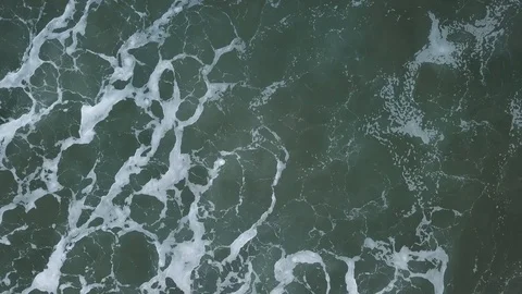Aerial View - Ocean Waves Breaking, Diagonal Low Altitude Overhead Stock Footage 102288851