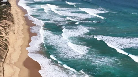 Aerial View of Ocean Waves Breaking on Portsea Beach Video stock 317281440